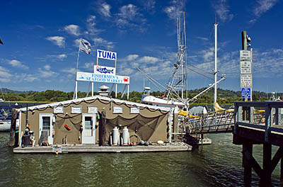 OR: South Coast Region, Coos County, Coos Bay Area, City of Coos Bay, Waterfront Boardwalk, Fishermen's Seafood Market floats just off the boardwalk, offering fresh local fish [Ask for #271.117.]