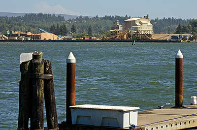 OR: South Coast Region, Coos County, Coos Bay Area, City of Coos Bay, Waterfront Boardwalk, View towards a timber processing plant at Eastside [Ask for #271.119.]