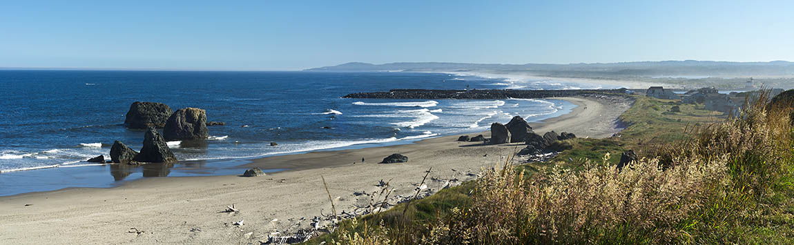 OR: Coos County, Bandon Area, South Beaches, Oregon Islands National Wildlife Refuge, Coquille Point. Panoramic view over golden sand beach with hoodoos, from the grassy cliff top [Ask for #274.318.]