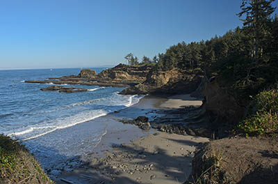 OR: South Coast Region, Coos County, Coos Bay Area, Cape Arago Parks, Yoakam Point State Park, View from the sea cliffs, over the beach below. [Ask for #276.152.]