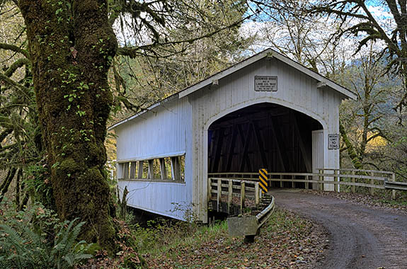 OR: Lane County, Coast Range, Hwy 36 Corridor, Deadwood Covered Bridge. Covered bridge carrying traffic for a gravel road. [Ask for #277.433.]